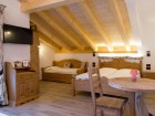 Chalet Resort Al Vecchio Fienile - Suites con Sauna e Cromoterapia in Val di Fiemme, Dolomiti del Trentino